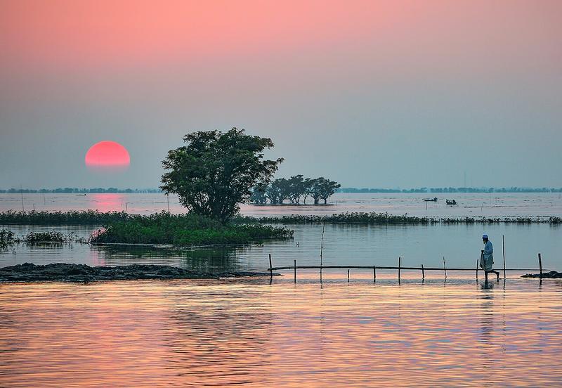 Sunset over the flooded wetland of Tanguar Haor